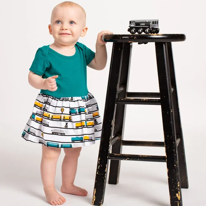 “ENGINEuity” Trains Infant Snapsuit Dress