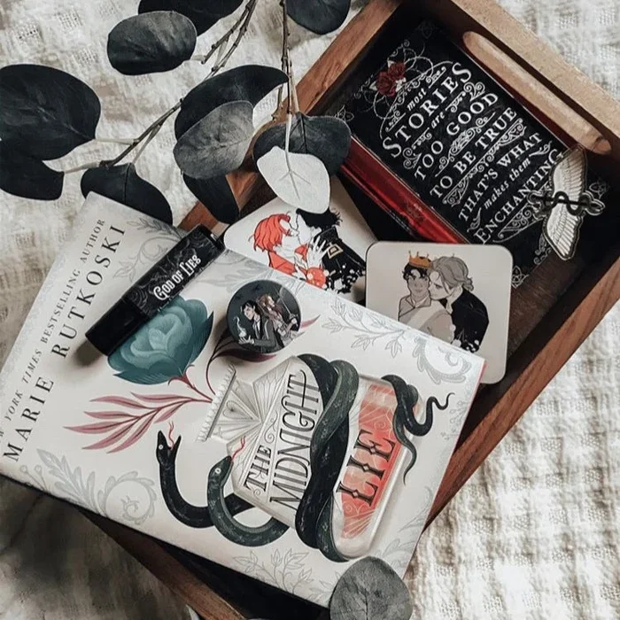 The Midnight Lie by Marie Rutkoski (Illumicrate ‘Sparks Fly’ Exclusive)